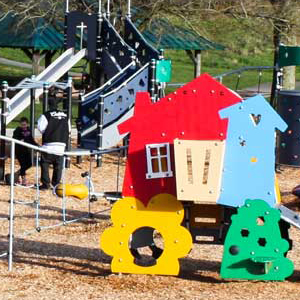 Play equipment for all ages, including pretend play and climbing structures for older children